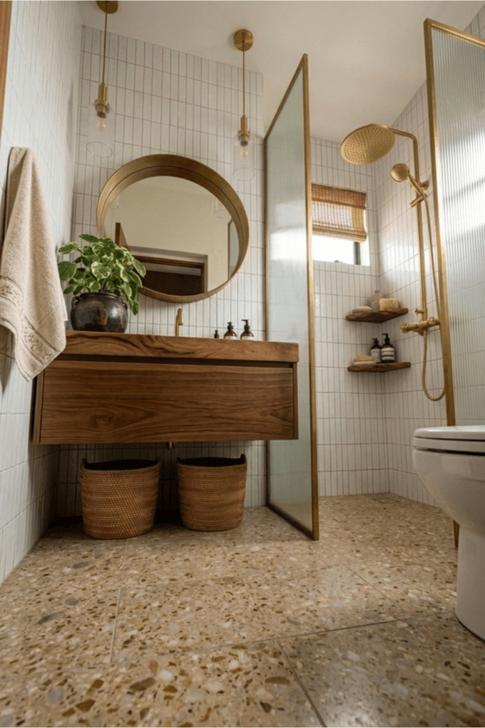small bathroom layout with floating vanity and glass shower showing open floor space and vertical tile design