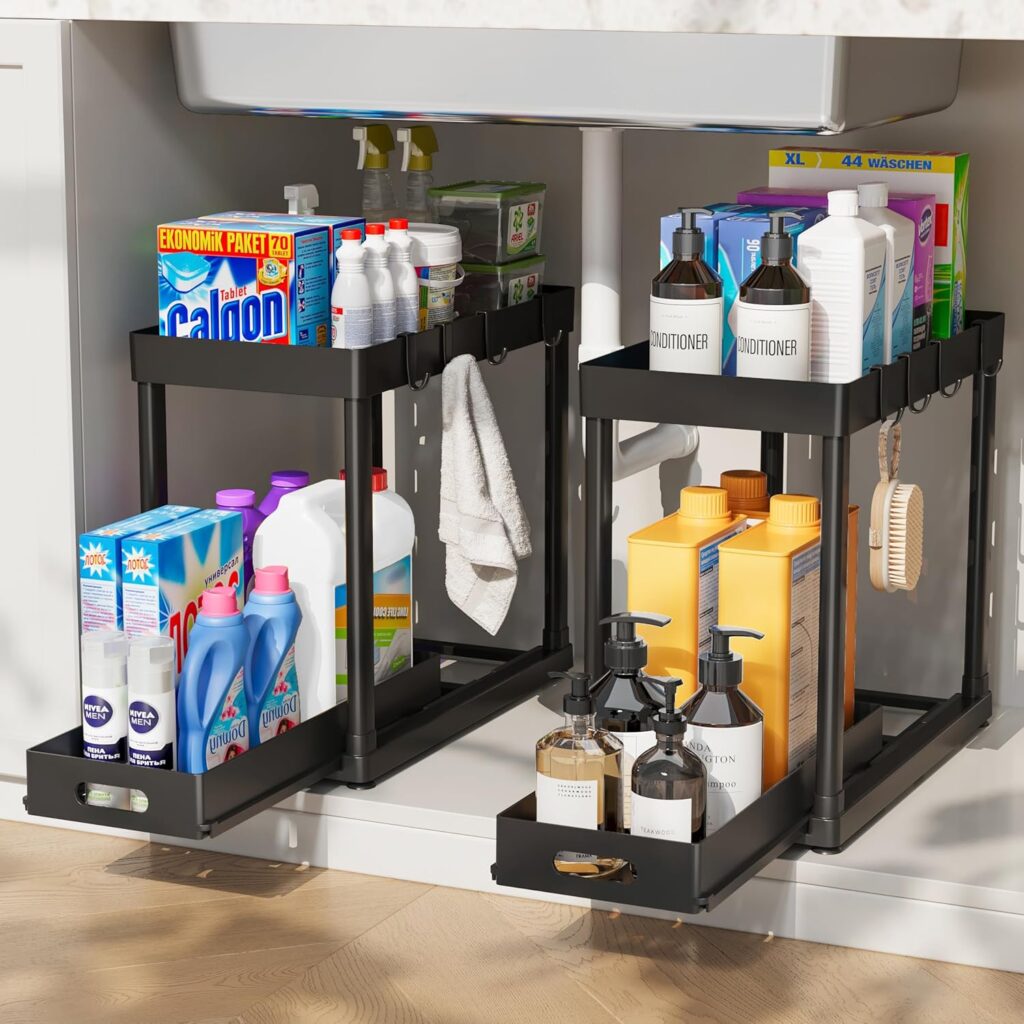 Black sliding under-sink organizer storing cleaning supplies and reducing clutter inside deep kitchen cabinets