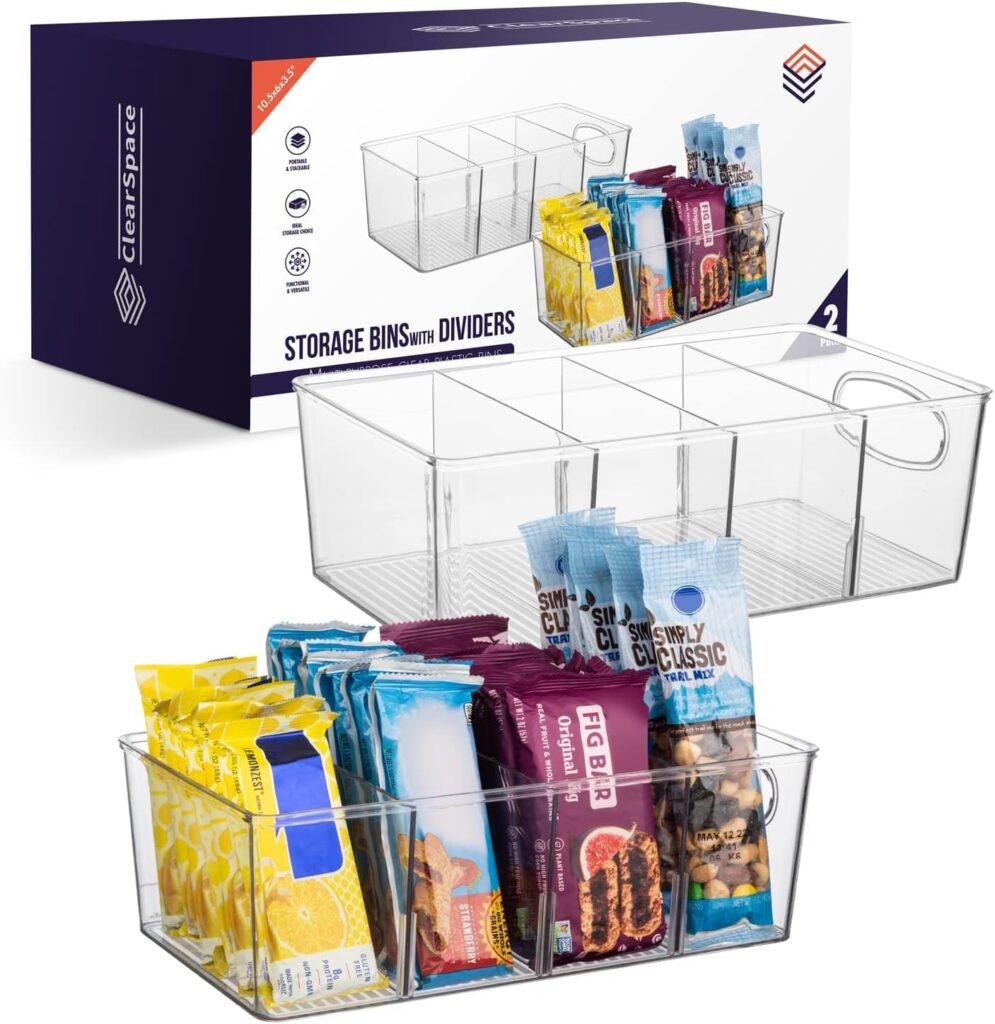 Clear divided pantry storage bins organizing snacks, packets, and small food items in a clutter-free kitchen