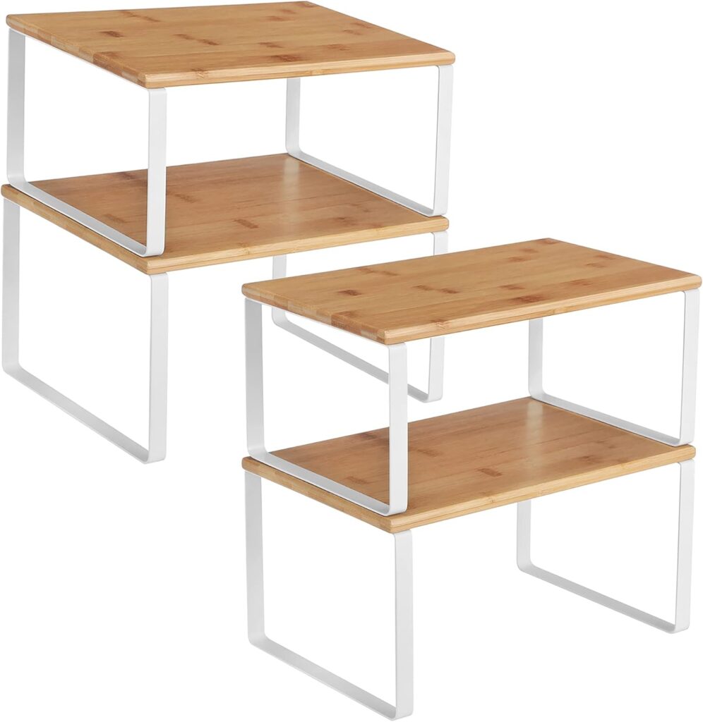 Bamboo cabinet shelf risers creating extra vertical storage space inside small kitchen cabinets