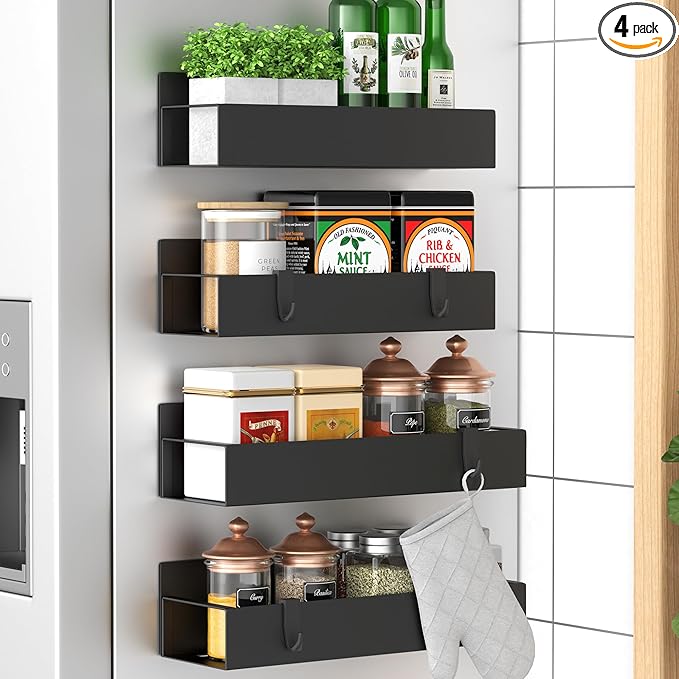Black magnetic spice rack mounted on the refrigerator to create extra kitchen storage without adding bulky cabinets