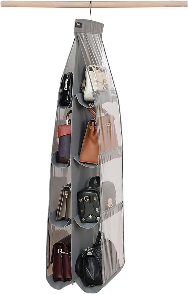 Vertical hanging purse organizer storing handbags neatly inside a small closet to reduce visual clutter in the bedroom