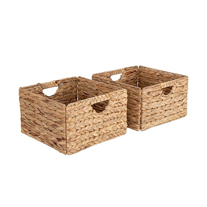 Woven neutral laundry basket creating a soft transition zone for worn clothes in a calm minimalist bedroom