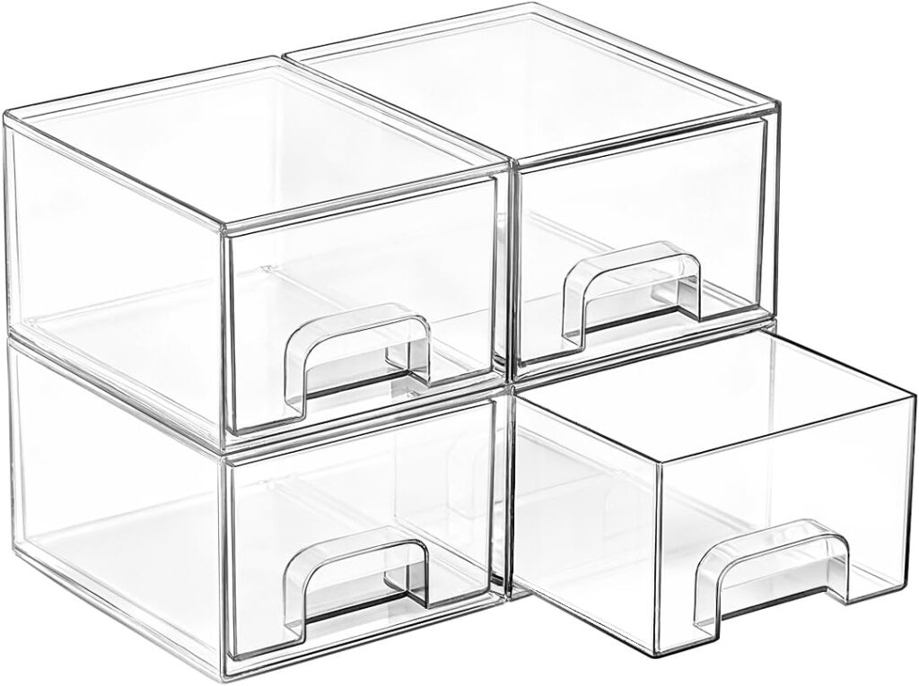 Small stackable clear bathroom drawers for organizing beauty products, hair accessories, cotton pads, and skincare essentials.