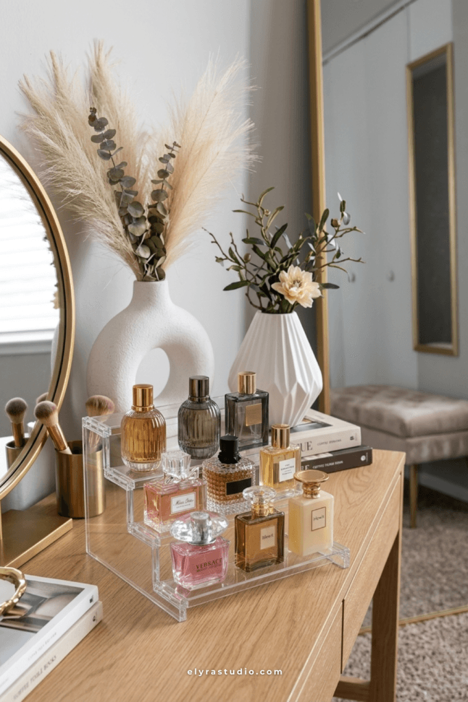 Luxury perfume organizer tray with layered acrylic shelves, gold mirror, and elegant vanity styling ideas